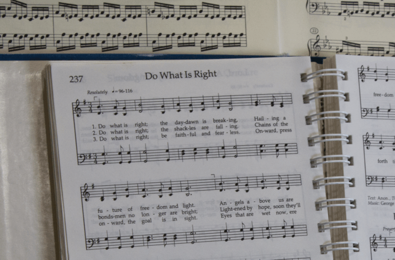 This hymn, here on the piano of one of the leaders of Mormon Women for Ethical Government, is cited by one of the plaintiffs in the case that is forcing Utah lawmakers to redistrict.