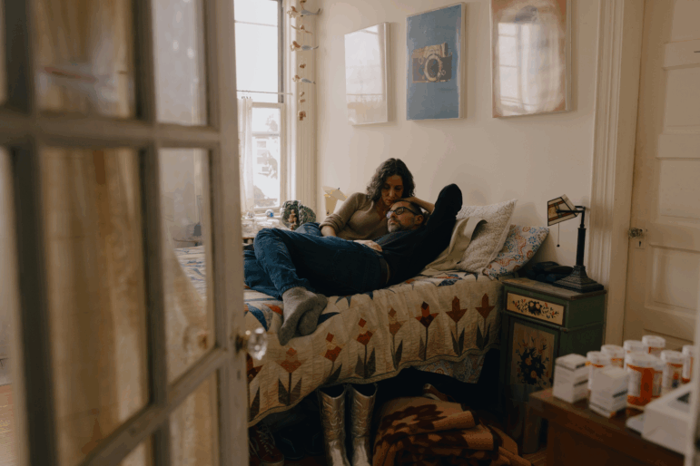 Cynthia Freeman and her husband Brad Lawrence in their apartment in Brooklyn, NY. Because they work freelance jobs as storytellers and podcasters, they rely on their Affordable Care Act insurance to treat Brad’s newly-diagnosed kidney disease.