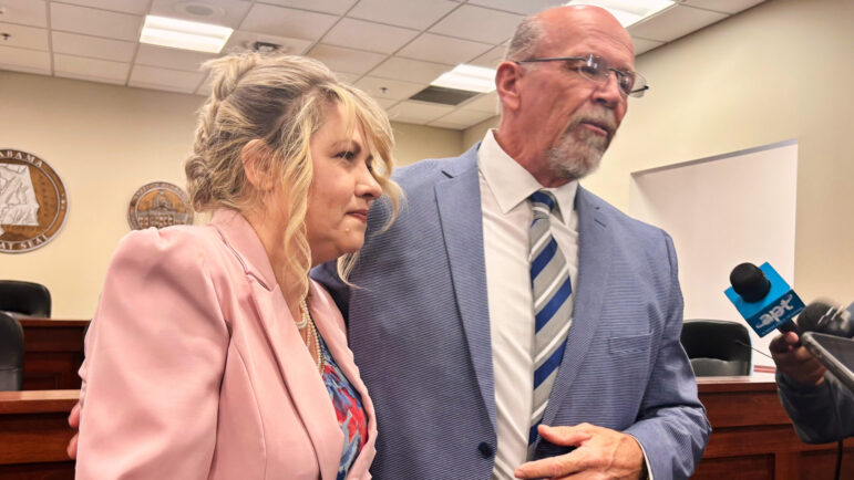 Alabama Medical Cannabis Commission Chairman Rex Vaughn, right, and Patients Advocate Amanda Taylor, left, answer questions after a meeting at the Alabama Statehouse.