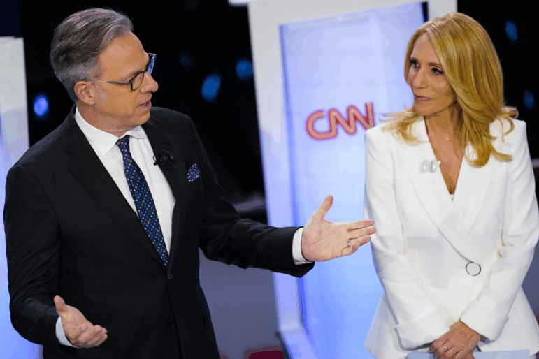 CNN anchors Jake Tapper and Dana Bash speaking to members of the audience before the start of the CNN Republican presidential debate in Des Moines, Iowa, Jan. 10, 2024.