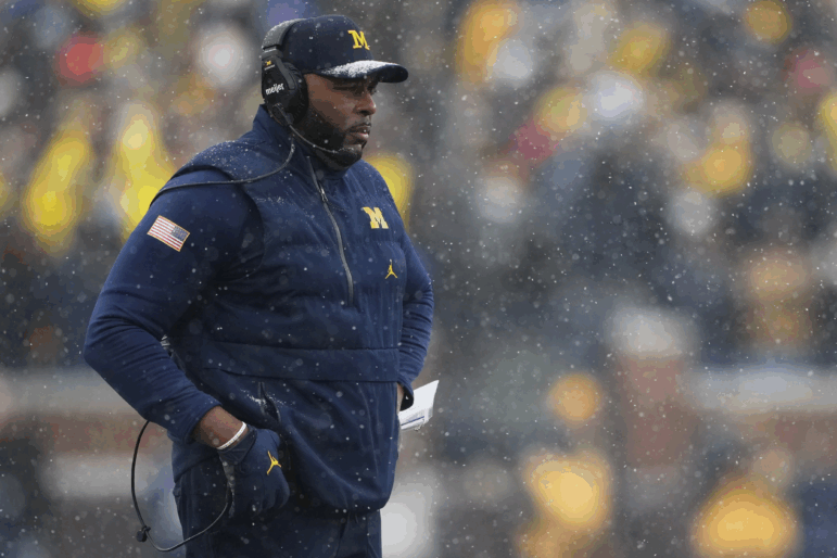 Michigan head coach Sherrone Moore watches from the sideline during the second half of an NCAA college football game against Ohio State, Saturday, Nov. 29, 2025, in Ann Arbor, Mich.