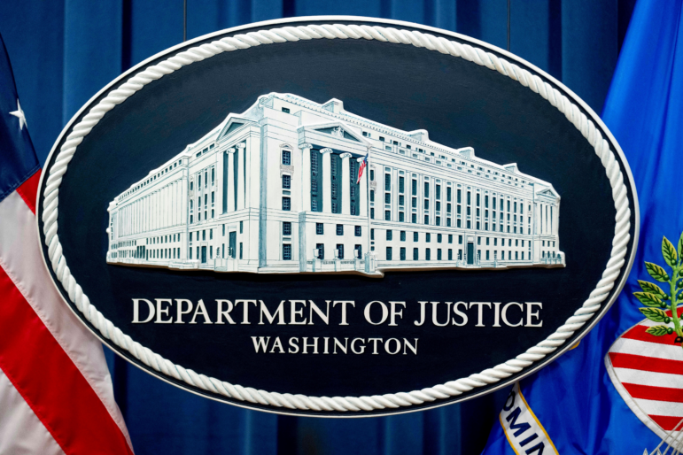 The Justice Department sign is shown in Washington on Nov. 18, 2022.