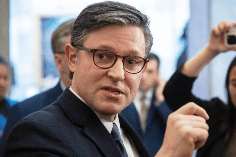 Speaker Mike Johnson, R-La., talks to reporters outside his office in the Capitol, Thursday, Dec. 4, 2025, in Washington.
