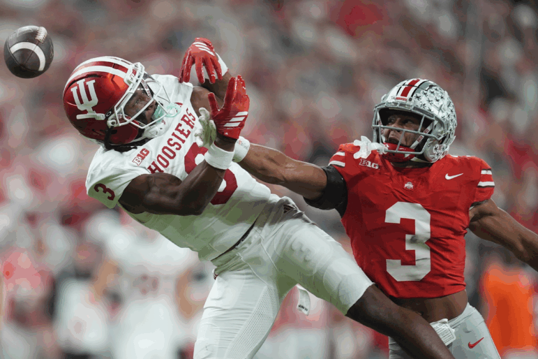 Ohio State's Lorenzo Styles Jr. breaks up a pass intended for Indiana's Omar Cooper Jr. during the first half of the Big Ten championship NCAA college football game in Indianapolis, Saturday, Dec. 6, 2025.