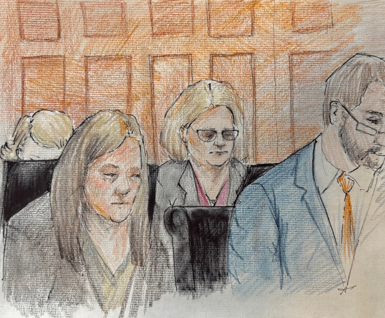 Milwaukee County Circuit Judge Hannah Dugan, center, depicted in a court sketch as jury selection in her trial begins in Milwaukee, Wis.