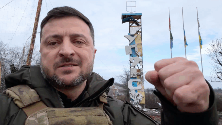 In this grab from a video provided by the Press Service Of The President Of Ukraine on Friday, Dec 12, 2025, Ukraine's President Volodymyr Zelenskyy records a video at the road entering of Kupiansk, Ukraine.