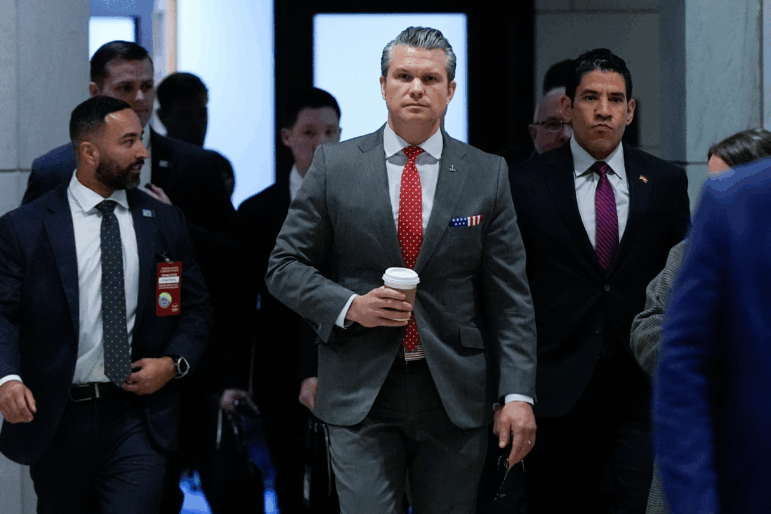 Defense Secretary Pete Hegseth arrives to brief members of Congress on military strikes near Venezuela on Tuesday at the Capitol in Washington.