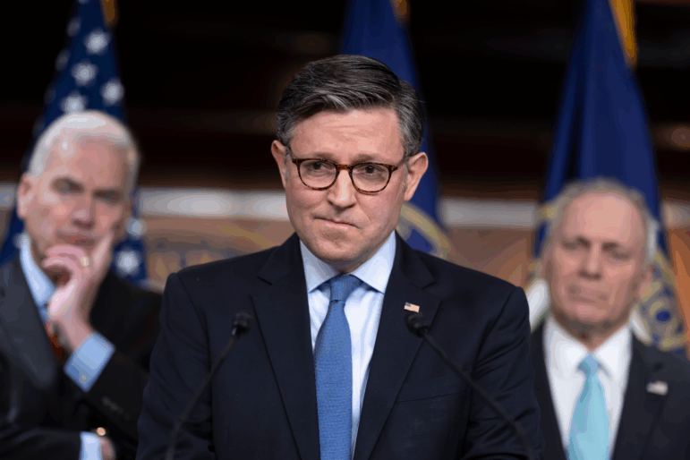 Speaker of the House Mike Johnson, R-La., meets with reporters at the Capitol on Tuesday as Republicans confront internal divisions over how to to address growing health care costs.