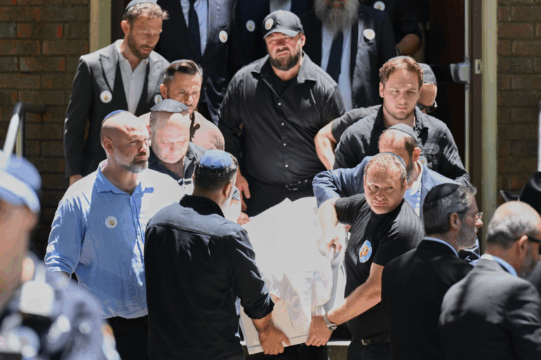 Family carry the coffin following a service for Bondi Beach mass shooting victim 10-year-old Matilda, whose last name is being withheld at the request of her family, in Sydney, Thursday, Dec. 18, 2025.