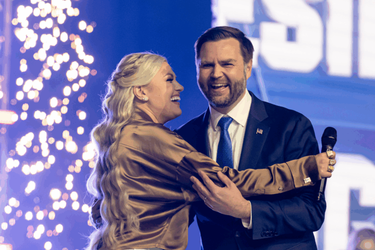 Erika Kirk greets Vice President JD Vance during Turning Point USA's AmericaFest 2025, Sunday, Dec. 21, 2025, in Phoenix.