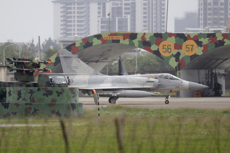 A Taiwan's Mirage 2000 fighter jet runs past an airplane fort at an airbase in Hsinchu, northern Taiwan, Tuesday, Dec. 30, 2025.