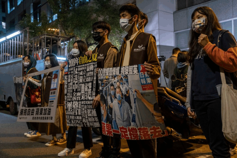People take part in a demonstration in support of the Taiwan Apple Daily, the last media company owned by the tycoon Jimmy Lai on Dec. 14, 2021, in Taipei, Taiwan.