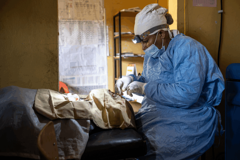 Ophthalmic nurse Sister Tadelech Yilma (R) performs a tarsotomy surgery on trachoma patient and farmer Scheicho Scheifa (C) to address the damage caused by an advanced stage of trachoma at a medical facility in a village near Butajira, on January 17, 2025. Trachoma is responsible for blinding or visually impairing nearly two million people worldwide. It is caused by infection with the bacterium Chlamydia trachomatis, which is spread through contact with the eyes or nose of infected people. According to the World Health Organization, trachoma is "hyperendemic in many of the poorest and most rural areas" of the world, and Africa is the most affected continent. Around 103 million people worldwide live in areas where the infectious disease is endemic, according to the UN agency. Nearly half of those people are in Ethiopia, research has estimated. (