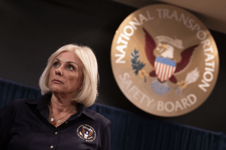 Chair of the National Transportation Safety Board (NTSB) Jennifer Homendy speaks to members of the Federal Aviation Administration before the second day of the National Transportation Safety Board (NTSB) Ronald Reagan Washington National Airport Midair Collision Investigative Hearing on July 31, 2025 in Washington, DC. The three-day investigative hearing examines the Jan. 29 mid-air collision between an American Airlines flight from Wichita, Kansas and a U.S. Army Black Hawk helicopter over the Potomac River that claimed the lives of 67 people.
