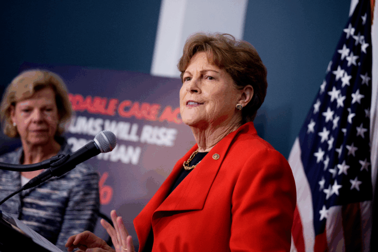 Sen. Jeanne Shaheen (D-N.H.), accompanied by Sen. Tammy Baldwin (D-Wis.) (L), speaks at a news conference to call on Republicans to pass Affordable Care Act tax breaks on Capitol Hill on September 16 in Washington, D.C.