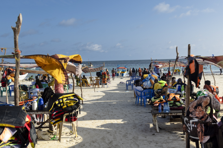 Vendors hawking food and flotation devices wait for visitors at Lido beach in Mogadishu on Nov. 10, 2025.