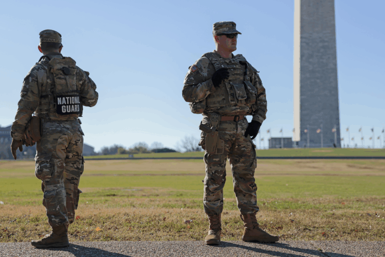 Members of the National Guard patrol along Constitution Ave. on December 01, 2025 in Washington, DC. Two West Virginia National Guard troops were shot blocks from the White House on November 26, resulting in the death of Sarah Beckstrom on Thursday, November 27, following what authorities called a targeted attack. (Photo by Heather Diehl/Getty Images)