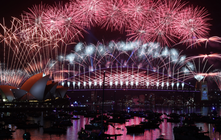 Fireworks light up the sky over the Sydney Harbour Bridge and the Sydney Opera House