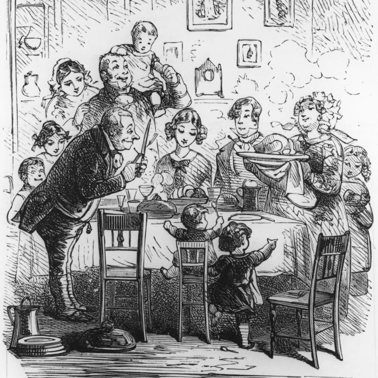 A family at their Victorian-era Christmas dinner, circa 1840.