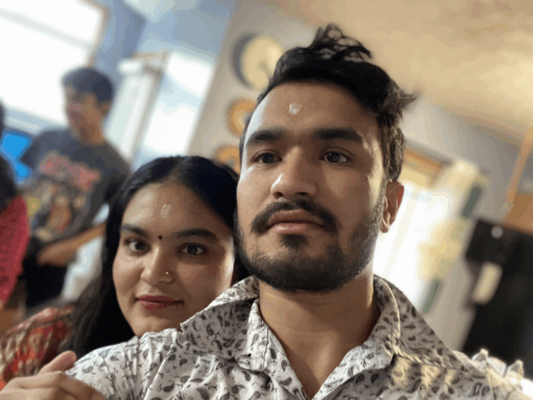 Mohan Karki (R) and his wife Tika Basnet (L) pose for a photo before he was detained by immigration agents in April.