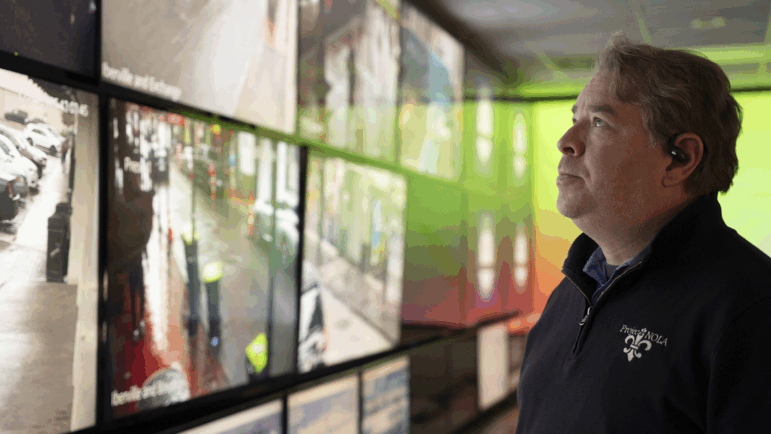 Bryan Lagarde, founder of Project NOLA, stands in front of a wall of screens displaying feeds from the nonprofit’s extensive crime camera network at its headquarters in New Orleans on Dec. 4. The system monitors thousands of cameras citywide to assist law enforcement and enhance public safety.