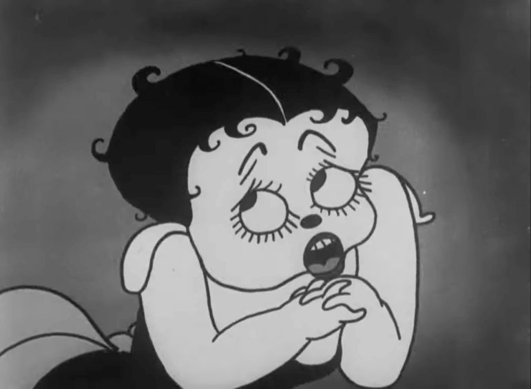 The original version of Betty Boop, as seen in a black-and-white “Dizzy Dishes” cartoon from 1930.