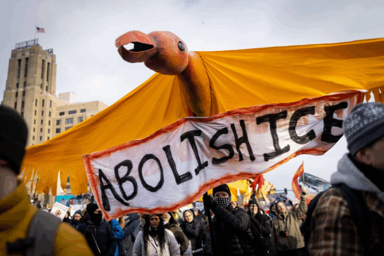 A large bird puppet crafted at In the Heart of the Beast Puppet and Mask Theatre in Minneapolis is carried down Lake Street during a march demanding ICE’s removal from Minnesota on Saturday, Jan. 10, 2026.