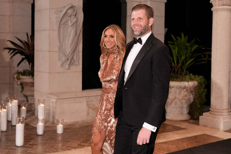 Eric Trump and Lara Trump arrive before President Donald Trump and first lady Melania Trump for a New Year's Eve celebration at his Mar-a-Lago club, Wednesday, Dec. 31, 2025, in Palm Beach, Fla.