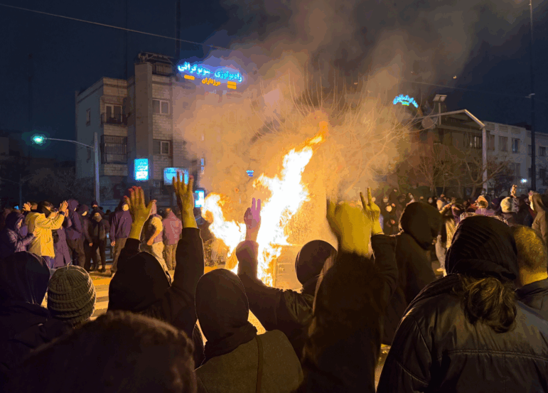 In this photo obtained by The Associated Press, Iranians attend an anti-government protest in Tehran, Iran, Friday, Jan. 9, 2026.