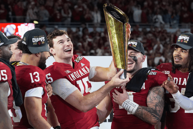 Indiana quarterback Fernando Mendoza holds the trophy after their win against Miami in the College Football Playoff national championship game, Monday, Jan. 19, 2026, in Miami Gardens, Fla.