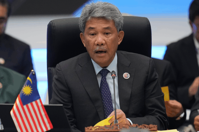 FILE -Malaysia's Foreign Minister Mohamad Hasan delivers a speech during the ASEAN foreign ministers' meeting in Kuala Lumpur, Malaysia, Oct. 25, 2025.