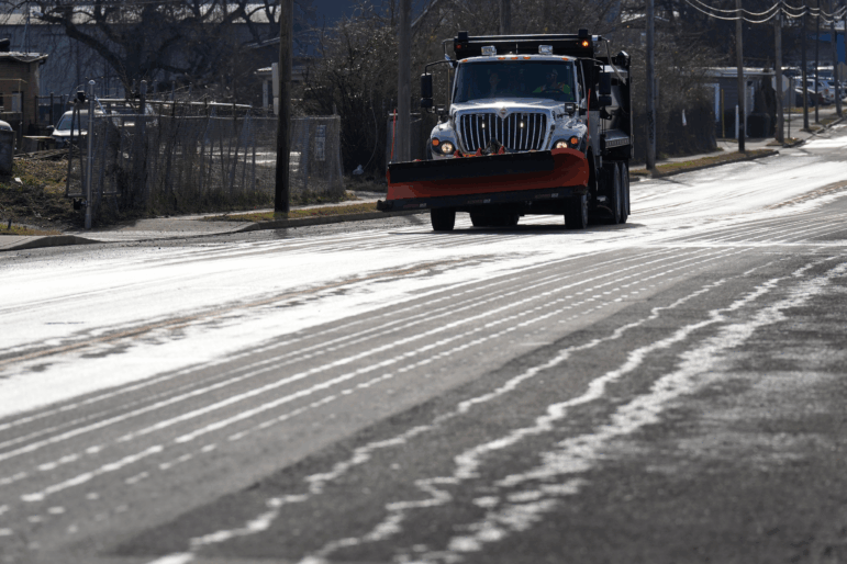 A Nashville Department of Transportation truck applies salt brine to a roadway Thursday, Jan. 22, 2026, in Nashville, Tenn. ahead of a winter storm.
