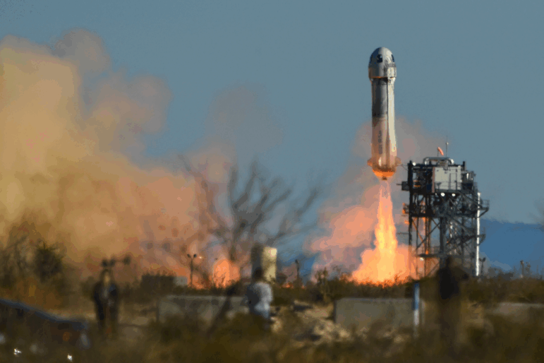 A Blue Origin New Shepard rocket launches from West Texas on March 31, 2022. Blue Origin has announced its stopping human space launches for at least two years as it focuses