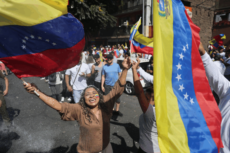 Venezuelans living in Chile celebrate in Santiago on Jan. 3, 2026, after US forces captured Venezuelan leader Nicolas Maduro after launching a "large scale strike" on Venezuela.
