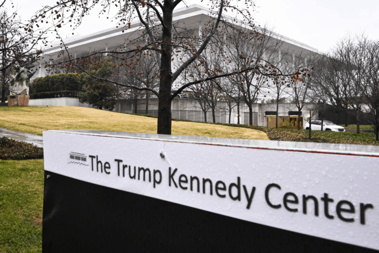 A recently installed sign at Washington, D.C.'s Kennedy Center on Jan. 10. The renaming of the center has not been approved by Congress. under the performing arts complex' A general view shows the Kennedy Center in Washington, DC on January 10, 2026. The Washington National Opera announced on January 9 that it would move its performances from the John F. Kennedy Center for the Performing Arts which has been its home since 1971. Artists have cancelled performances at Washington's premier performing arts center to protest its renaming to include US President Donald Trump. (Photo by Mandel NGAN / AFP via Getty Images)