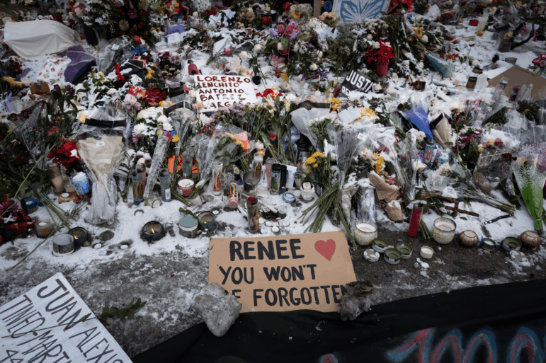 Snow covers a memorial to Renee Macklin Good on Jan. 10 in Minneapolis.