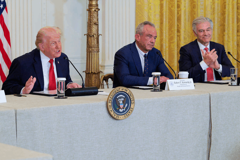 WASHINGTON, DC - JANUARY 16: (L-R) U.S. President Donald Trump speaks as U.S. Secretary of Health and Human Services Robert F. Kennedy Jr. and Administrator for the Centers for Medicare & Medicaid Services Mehmet Oz look on during a rural health roundtable on January 16, 2026 in Washington, DC.