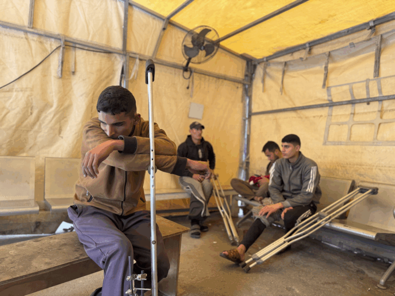 Patients at a MSF-run clinic in Gaza City receive treatment on Dec. 31, 2025.