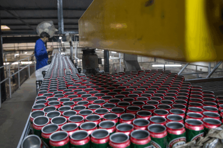 A worker stands stands in the factory where beer is produced at Murree Brewery on Nov. 29, 2025 in Rawalpindi, Pakistan.