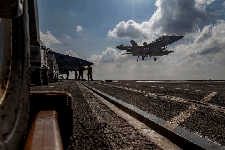 This handout image from the U.S. Navy shows an EA-18G Growler landing on the flight deck of the Nimitz-class aircraft carrier USS Abraham Lincoln in the Indian Ocean on Jan. 23, 2026.