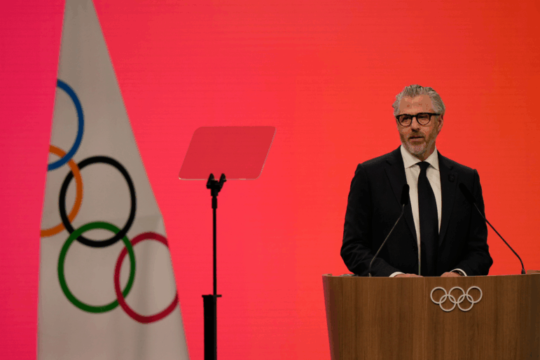 Casey Wasserman, Chairman of the Los Angeles Organizing Committee for the 2028 Olympic and Paralympic Games speaks during an IOC meeting ahead of the 2026 Winter Olympics, in Milan, Italy, Tuesday, Feb. 3, 2026. (AP Photo/Luca Bruno)