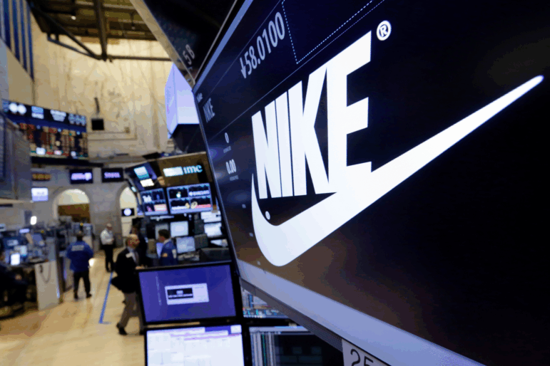 The Nike logo appears above the post where it trades on the floor of the New York Stock Exchange, March 22, 2017.