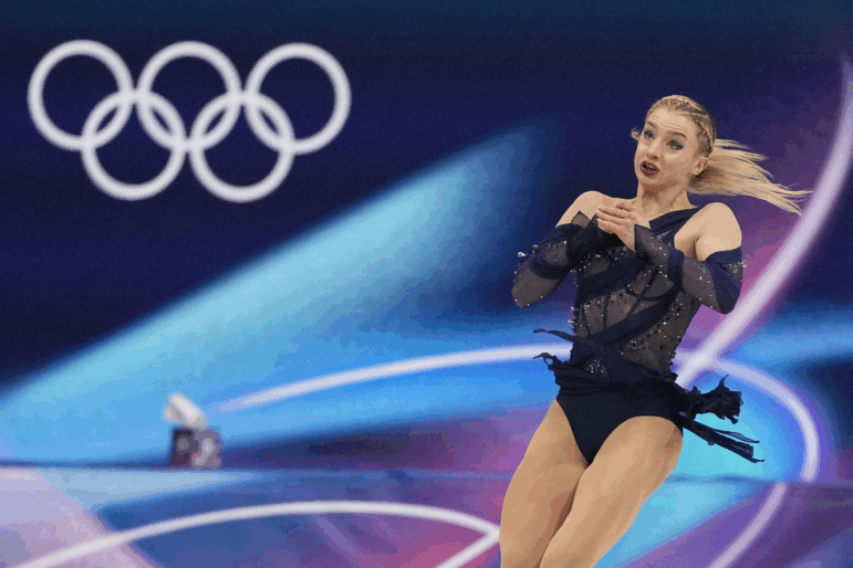 Amber Glenn of the United States competes during the figure skating women's team event at the 2026 Winter Olympics, in Milan, Italy, Sunday, Feb. 8, 2026. Glenn says she's received online hate and threats for speaking out in support of LGBTQ rights in Milan.