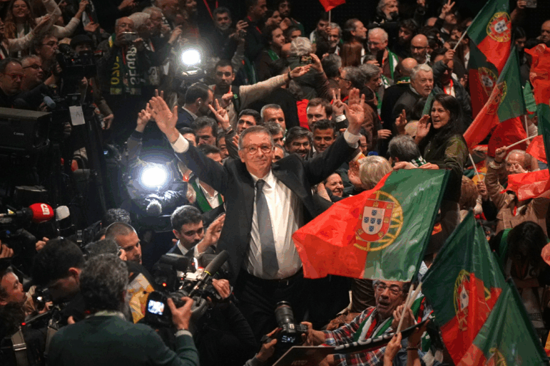 Center-left Socialist candidate António José Seguro celebrates after defeating far-right populist André Ventura in the second round of Portugal's presidential election in Lisbon, Sunday, Feb. 8, 2026.