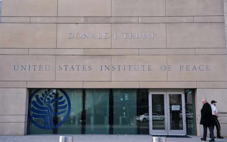 President Donald Trump's name is seen on the U.S. Institute of Peace building, Dec. 4, 2025, in Washington.