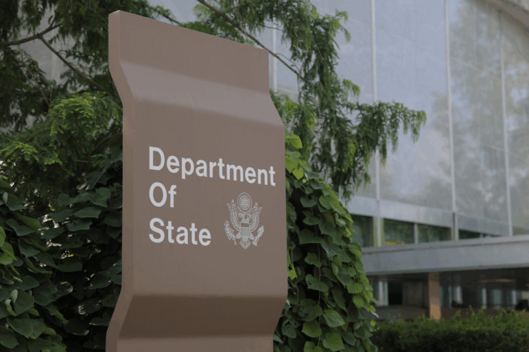 A sign for the State Department stands outside the Harry S. Truman Federal Building in Washington, D.C., on July 11, 2025.