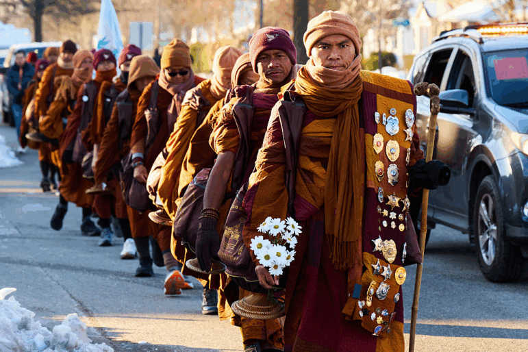 Led by Bhikkhu Pannakara (R), Buddhist monks participate in a "Walk for Peace" in Richmond, Virginia, on February 3, 2026. The group is walking from Fort Worth, Texas, to Washington, DC to promote peace, compassion and nonviolence.