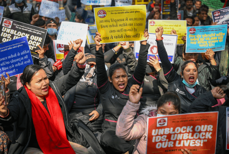 NEW DELHI, INDIA - FEBRUARY 3: Gig workers, predominantly women from the beauty and home services sector, stage a protest at Jantar Mantar to demand employee status and labor protections on February 3, 2026 in New Delhi, India. Workers are seeking to be classified as employees rather than partners to gain access to minimum wage, PF, and ESI benefits. One of the major grievance is the unilateral suspension of worker IDs by platforms based on opaque rating systems or customer complaints without a fair hearing. (Photo by Sanchit Khanna/Hindustan Times via Getty Images)