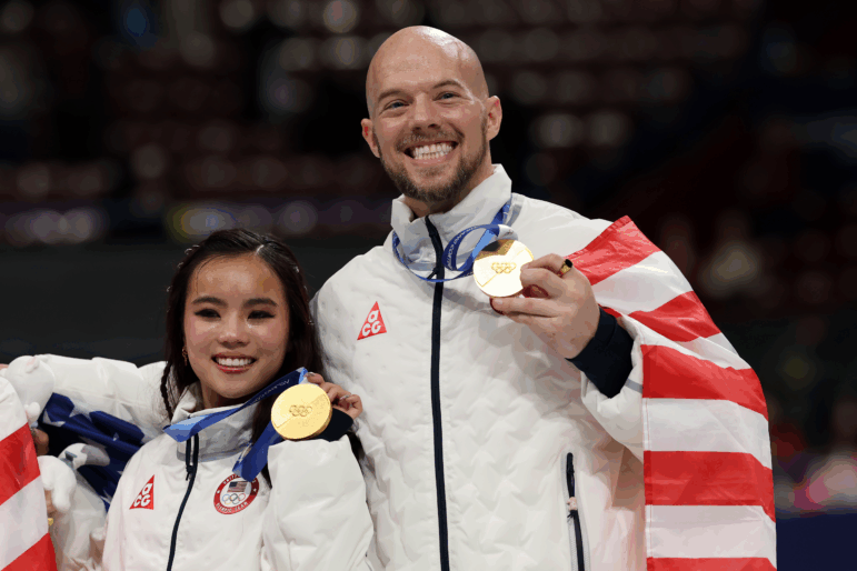 Ellie Kam and Danny O'Shea helped U.S. win gold in the team event, the first figure skating medal of the Games.