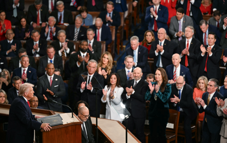 Members of Congress stand up and applaud as President Donald Trump delivers the State of the Union address in Washington, D.C., on Feb. 24.